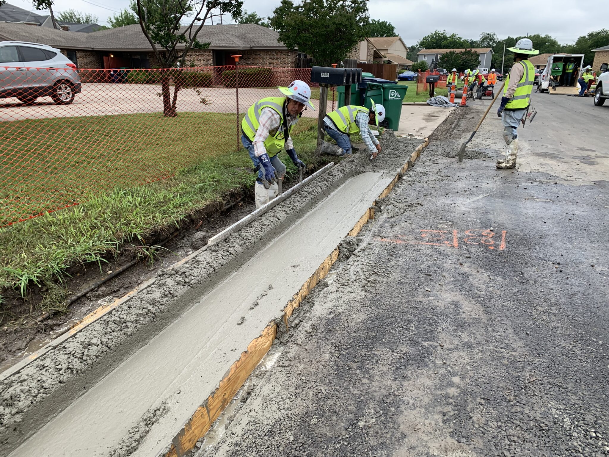 Shaping Curb on Camelot St.