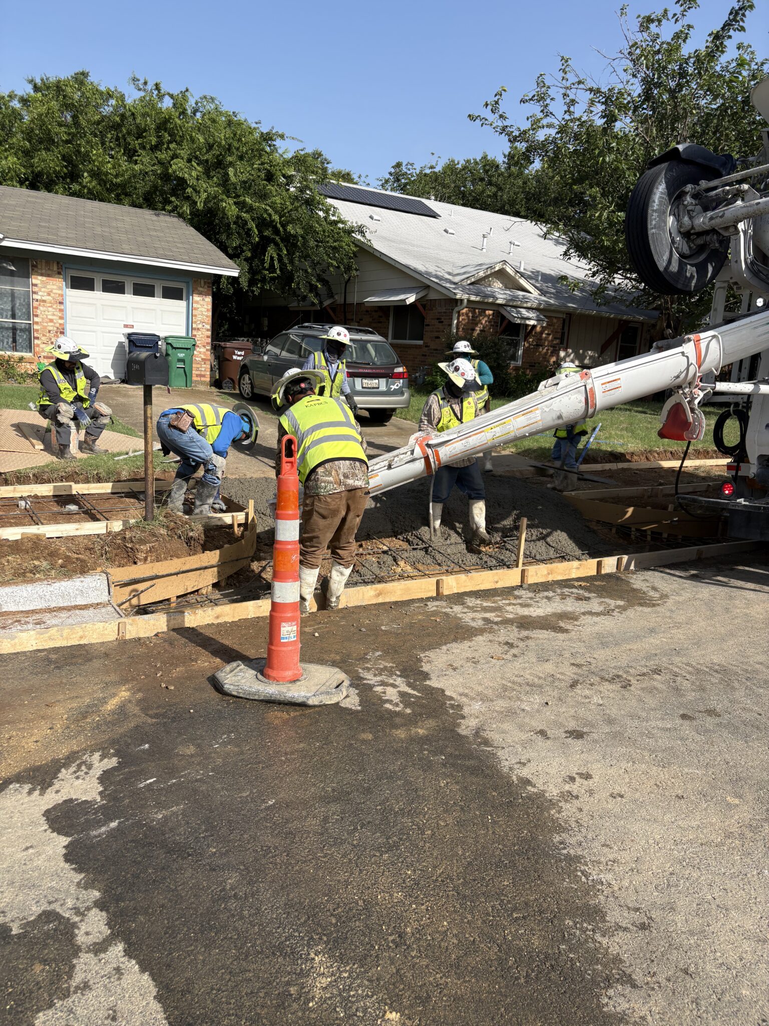 Pouring Concrete to Form Driveway