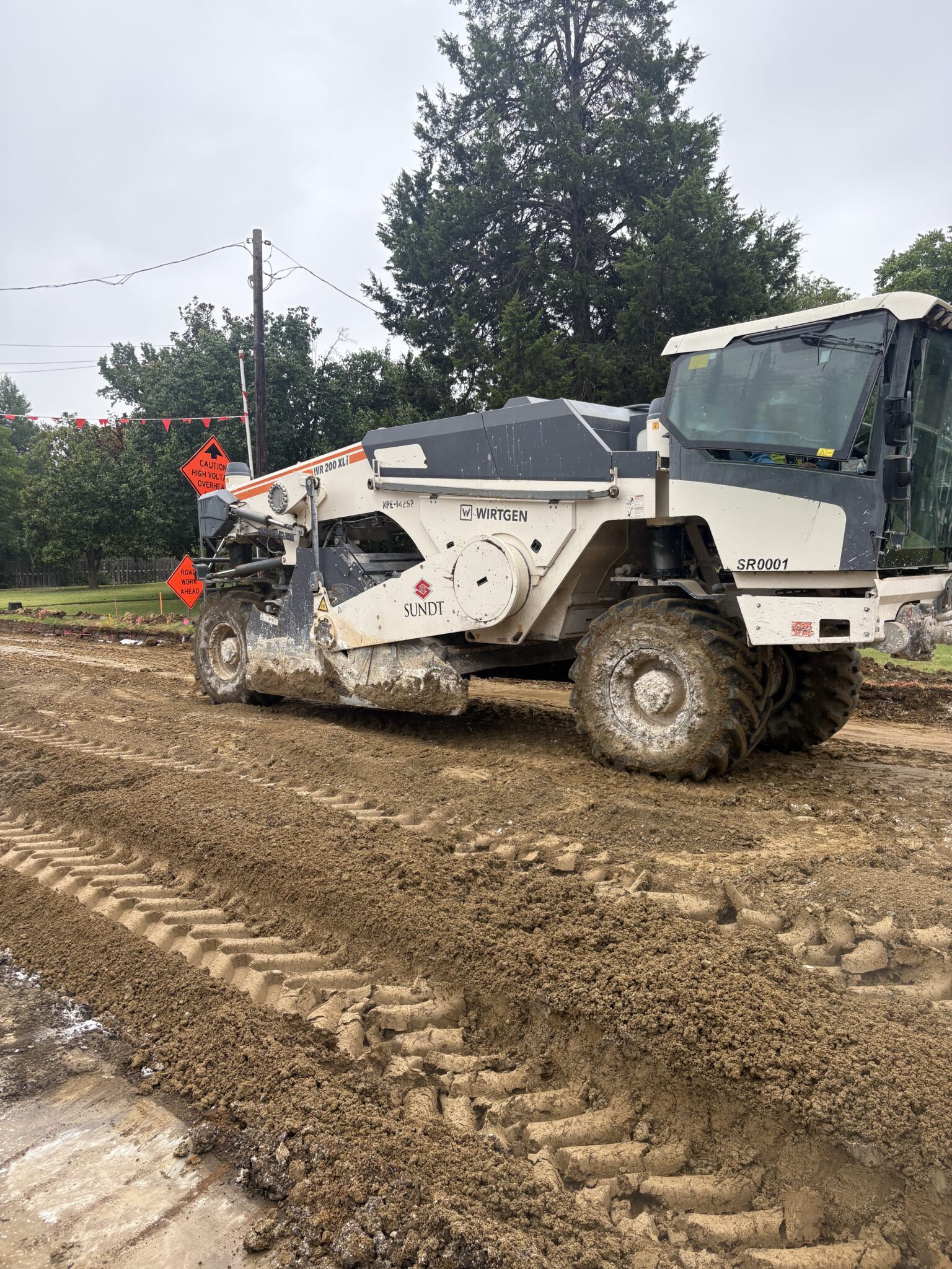 Mixing Lime into Subgrade on Del Dr